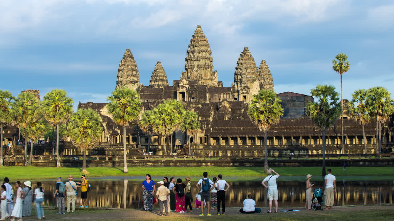 Crowds of tourists entering the Angkor causeway, time lapse, Siem Reap, Cambodia.