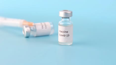 covid-19 vaccine vial and syringe