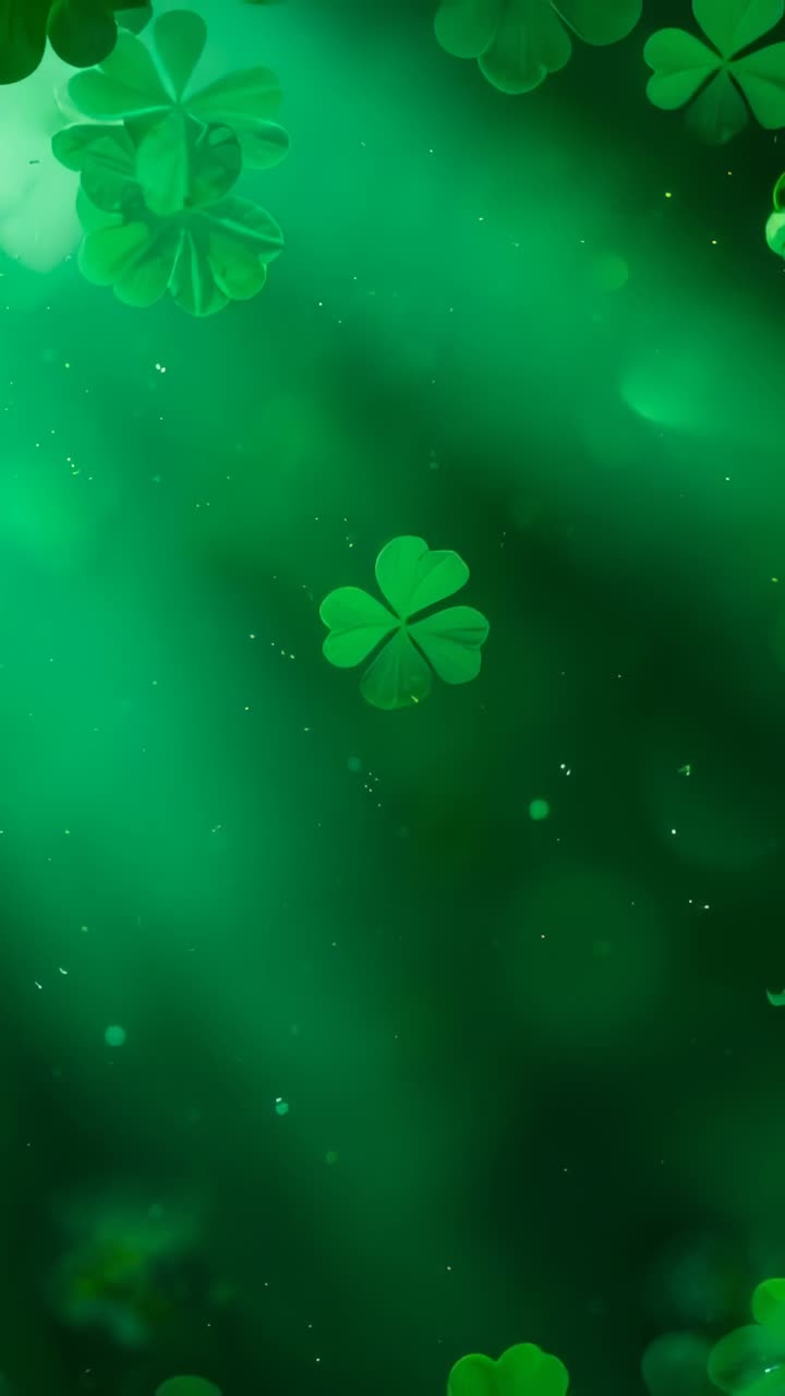 Vertical video: Drifting 4leaf clover as clovers entering on green scene making calm mood with dust
