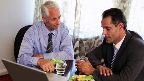 businessmen having a working lunch