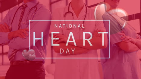 animation of national heart day text over happy caucasian doctors