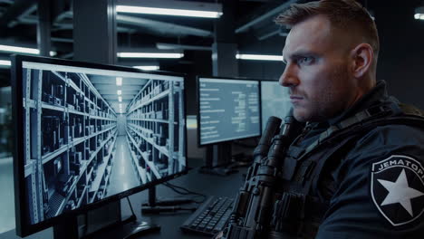 a man working in an office with computers