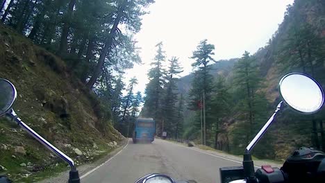 motorcycle-ridding-at-mountain-road-at-day-from-rider-view-at-manali-leh-ladakh-highway-at-himachal-pradesh-india-on-Mar-22-2023