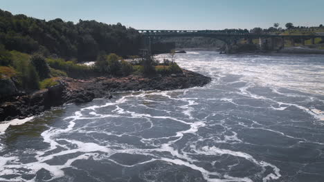 flying a drone over reverse falls in new brunswick, canada