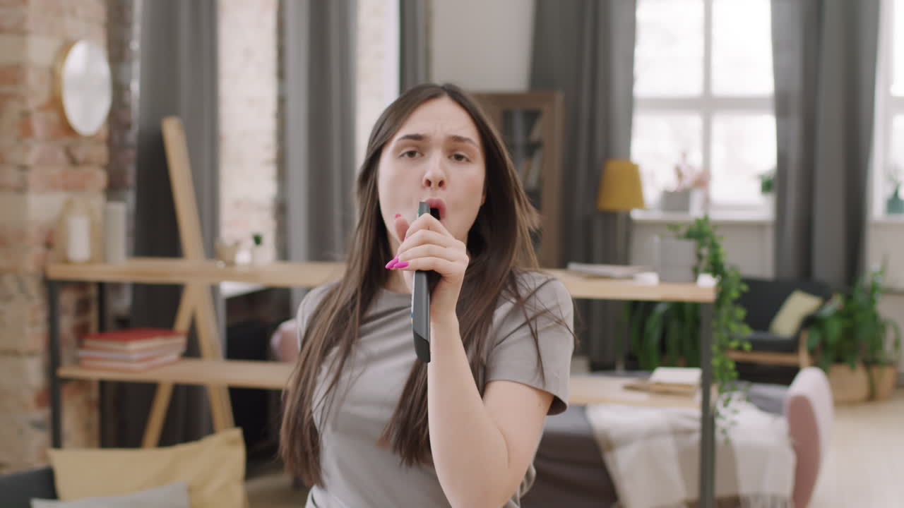 Energetic Woman Singing before Camera