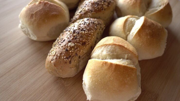 Bread on Wooden Background Rotates