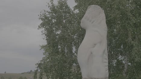 abstract stone sculpture in a natural setting