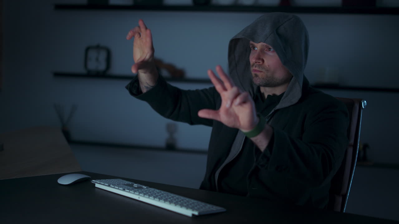 Man in his room simulating zooming work with volumetric displays