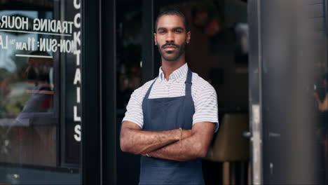 confident restaurant employee at the entrance