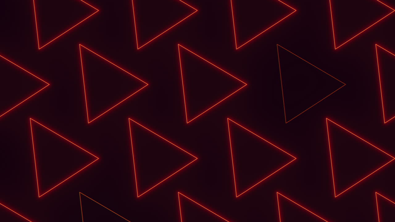 los dinámicos triángulos de neón rojo crean un patrón llamativo