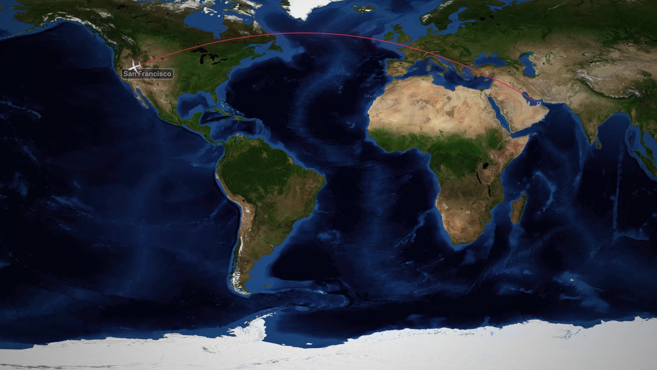 Una linea rossa traccia un aereo che vola da Dubai a San Francisco sulla mappa del mondo