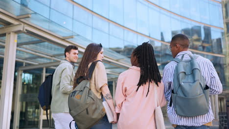 University,-talking-and-students-walking