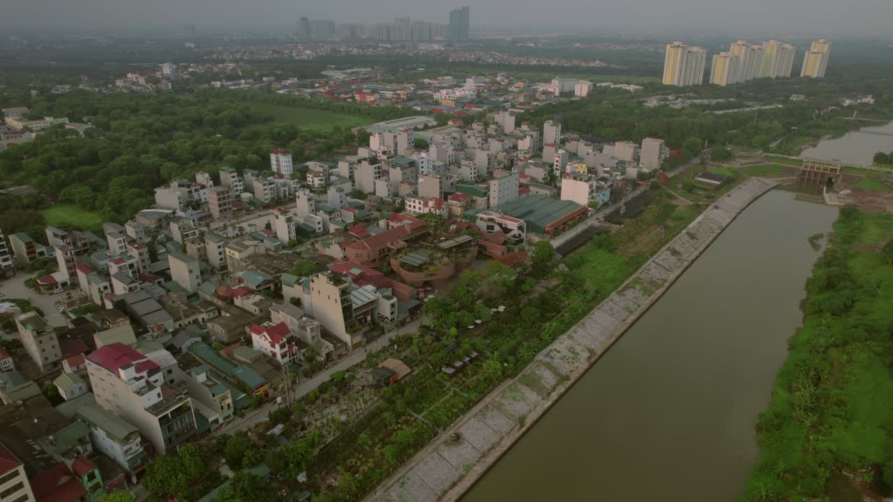 Aerial View of a Residential Area with Canal and Cityscape