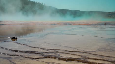 steam coming off the boiling super heated waters of the grand prismatic hot spring