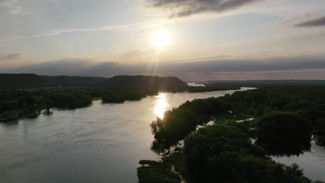 sunset over a river, aerial view