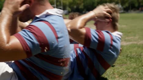 determined rugby players doing crunches 4k 4k