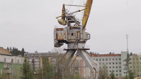 old rusty cranes at the abandoned factory