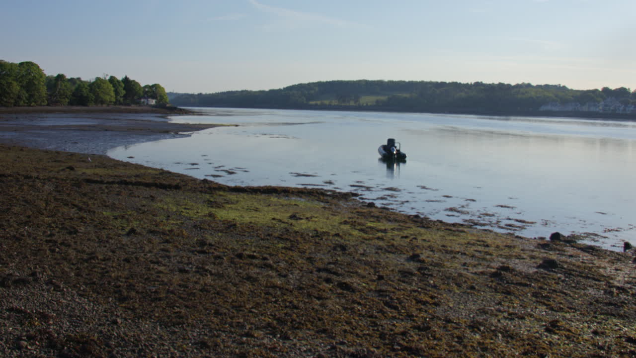 wide shot looking up the Menal Strait in the early morning low tide at Moel Y Don, Llanfairpwllgwyngyll