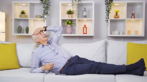 The-old-man-lying-on-the-sofa,-serene-and-peaceful.