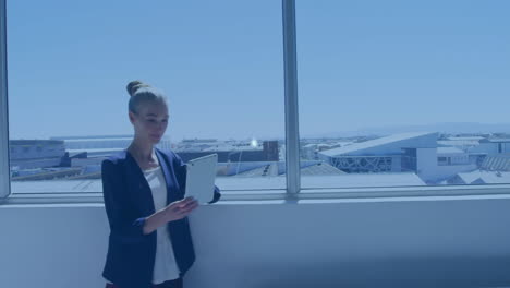 animation of network of connections with icons over caucasian businesswoman at airport