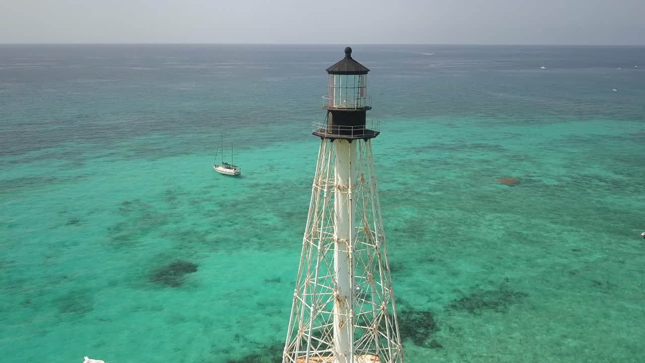 Drone shot of lighthouse In Atlantic Ocean off coast of Islamorada, Florida.