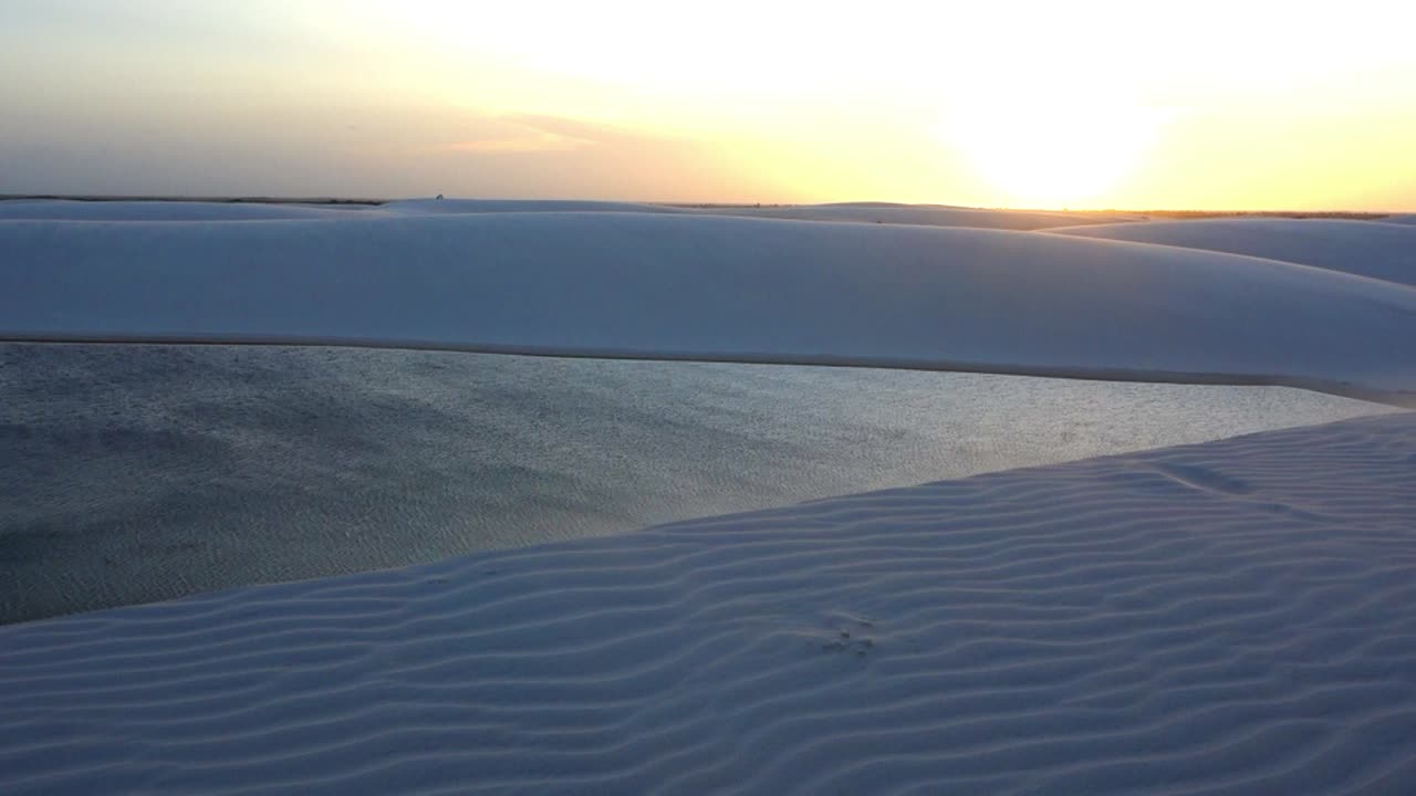 Lençois Maranhenses, Maranhao, Brazil. Sunset aerial landscape of brazilian national park. sand dunes and rainwater lakes