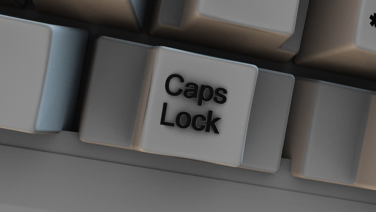 Close-up of Caps Lock Button Key on Computer Keyboard. Great for business presentations, online education, and workplace productivity videos