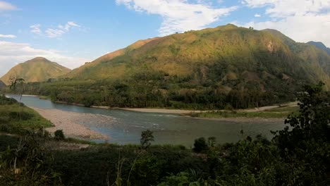 calm river flowing between mountains