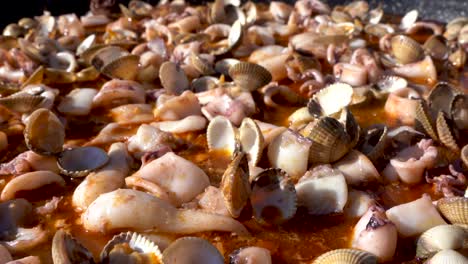 paella cooking, typical cuisine of the valencian community in spain