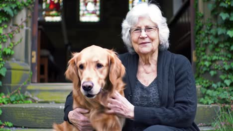 a heartwarming moment between an elderly woman and her loyal golden retriever, sharing joy and companionship in a serene outdoor setting