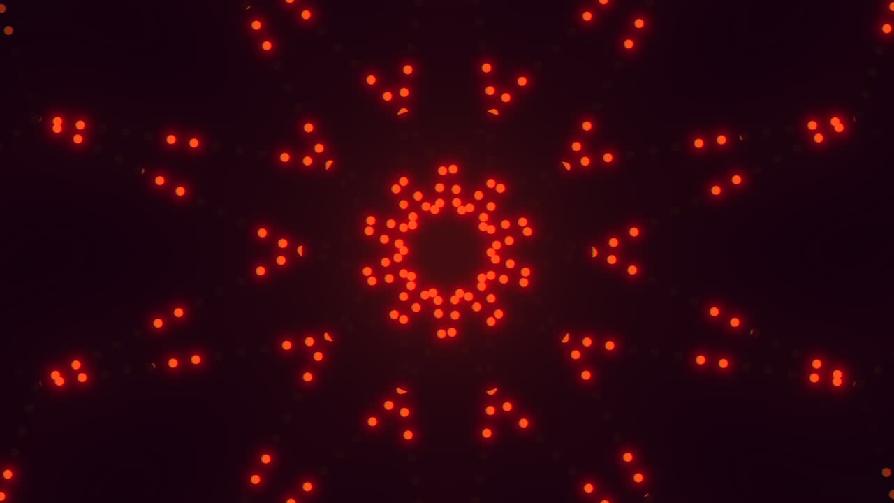 el círculo de puntos rojos radiantes brilla en un patrón simétrico