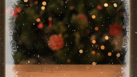 composición de video con nieve sobre la habitación con decoraciones de navidad vistas a través de una ventana helada