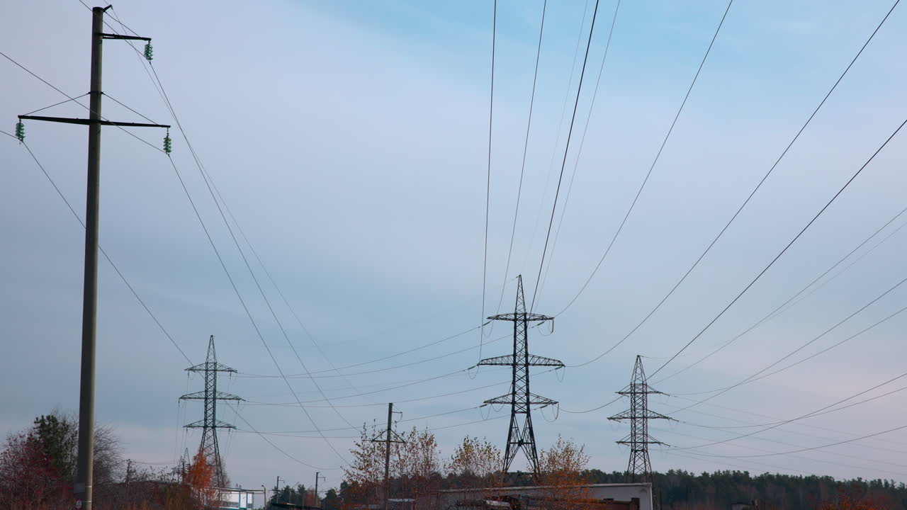 Electrical power lines against a cloudy sky