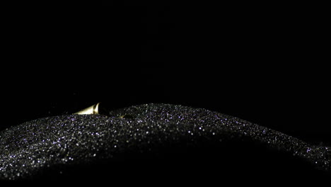 6mm advanced rifle cartridge falling into the black powder