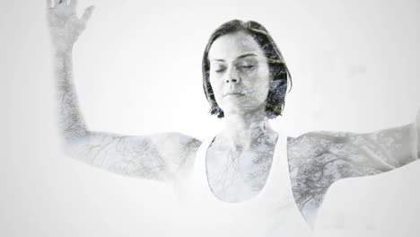 double exposure of woman practicing yoga