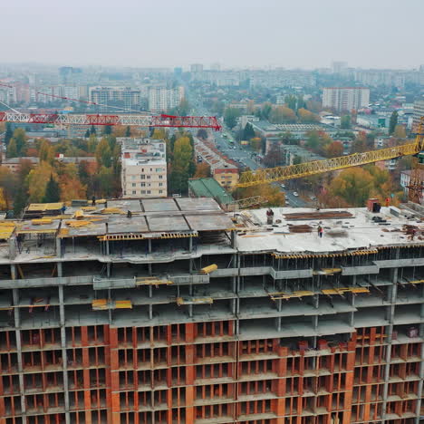construction site of modern multi-storey building in the city. aerial panoramic view on a construction of a new building.