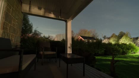 Stars-And-Clouds-Moving-In-The-Night-Sky-From-A-House-Porch