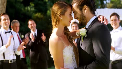 bride and groom embracing and guest applauding in background 4k 4k