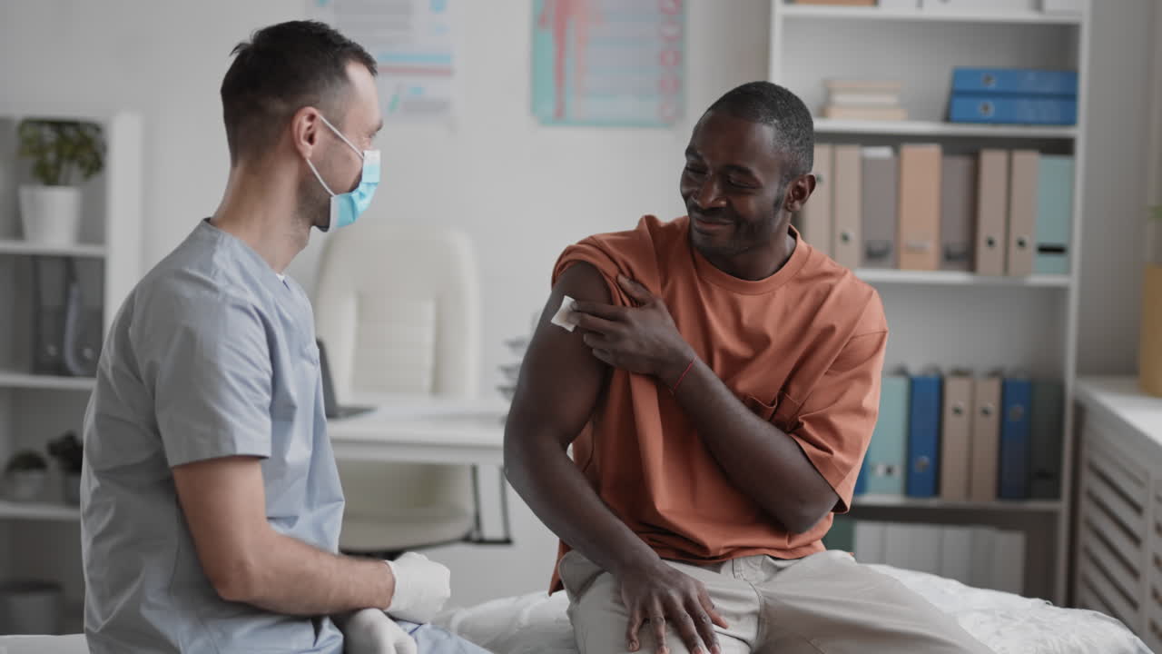 Man and Doctor Bumping Fists