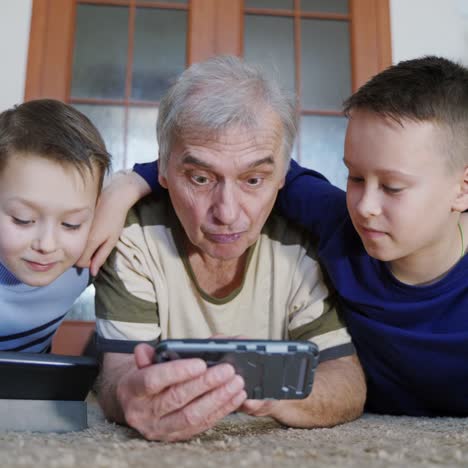 Parents playing on phone together