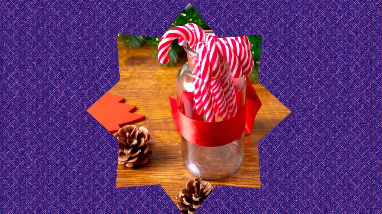 video de bastones de caramelo en forma de estrella sobre un fondo azul en navidad