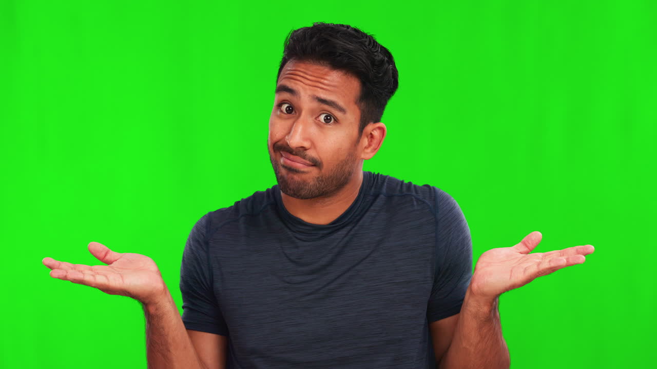 Confused, doubt and shrug with a man on a green
