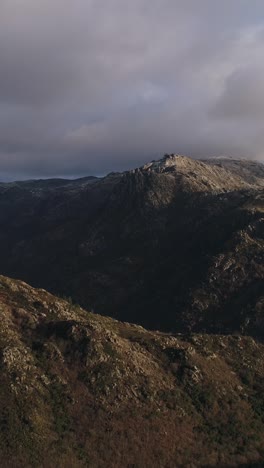 mountain peaks and clouds vertical video