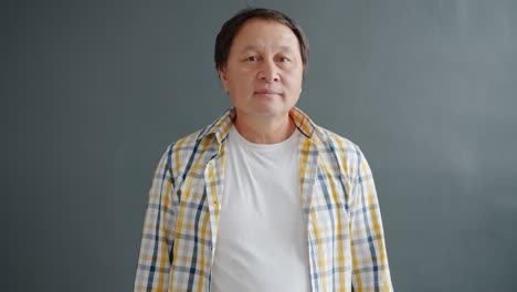 surprised asian man