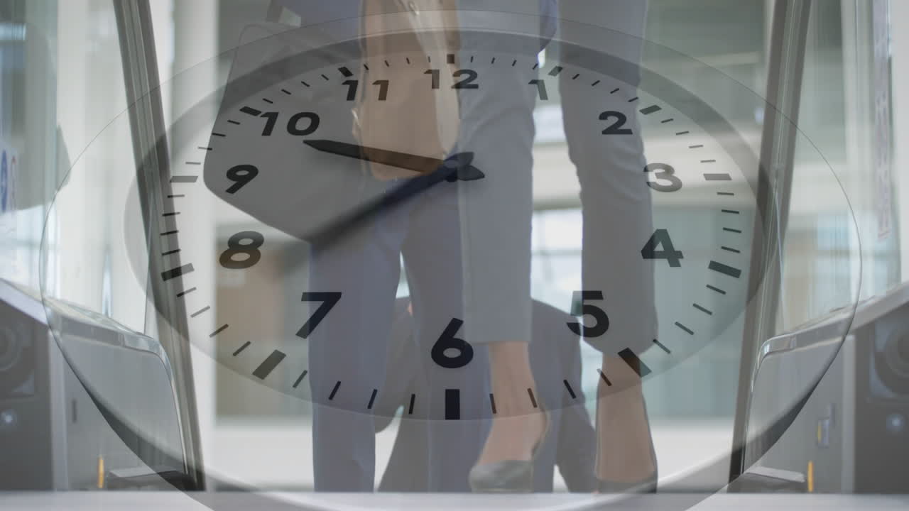 Clock animation overlaying business people walking in office building