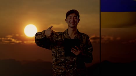 military personnel with tablet during sunset