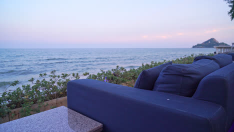 empty outdoor sofa with sea beach view