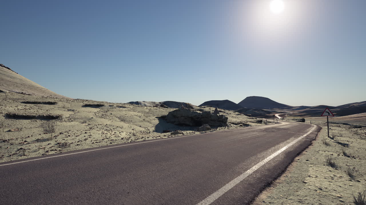Scenic view of a winding road through the arid landscapes of mongolia