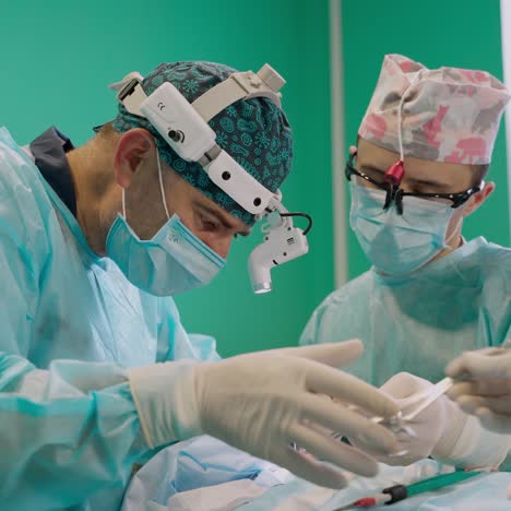 medical team performing surgery in hospital