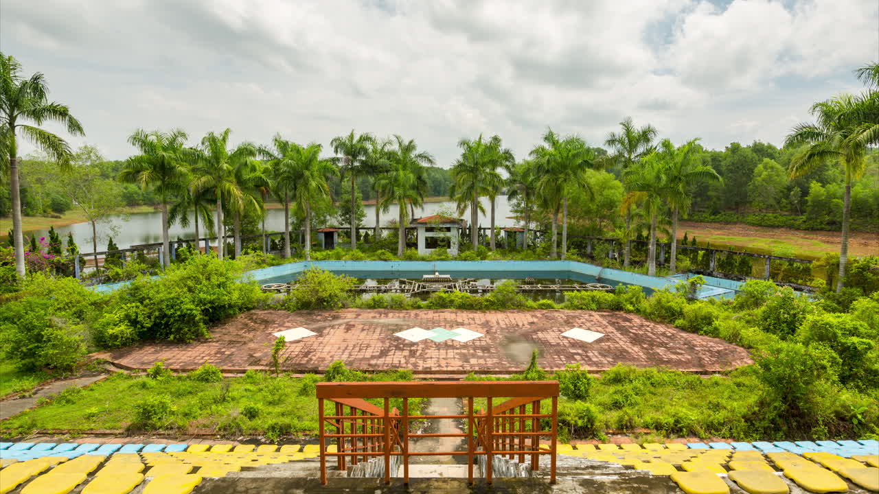 A static time-lapse view looking over a forgotten water theme park in Vietnam